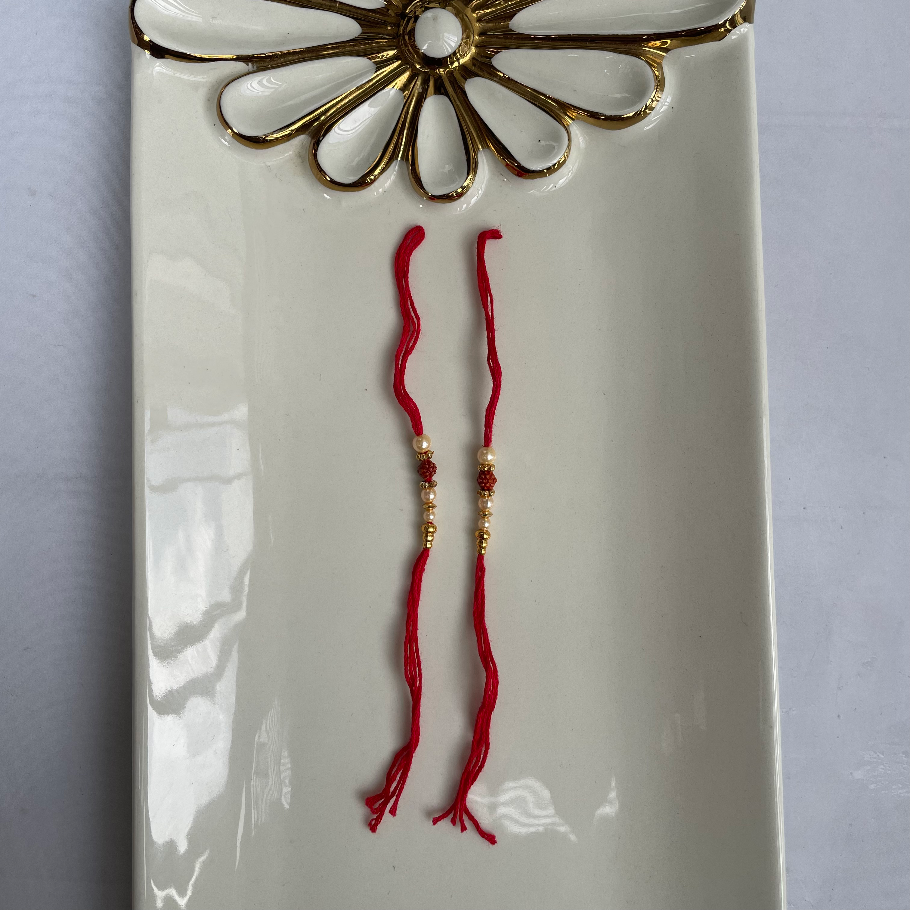 Rakhi Thread 11 set of 6 image 0