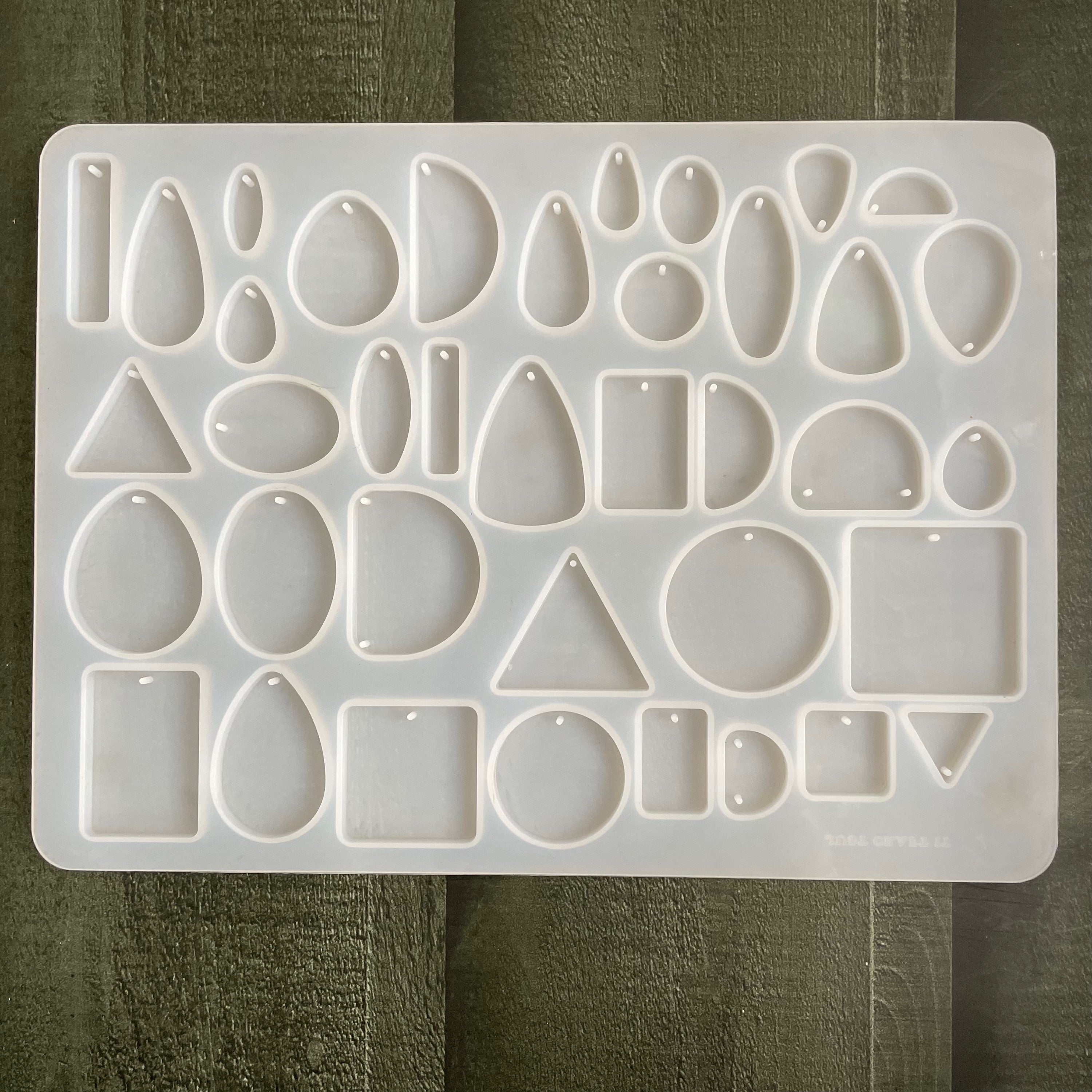 38 cavity keychain and jewellery mould image 0