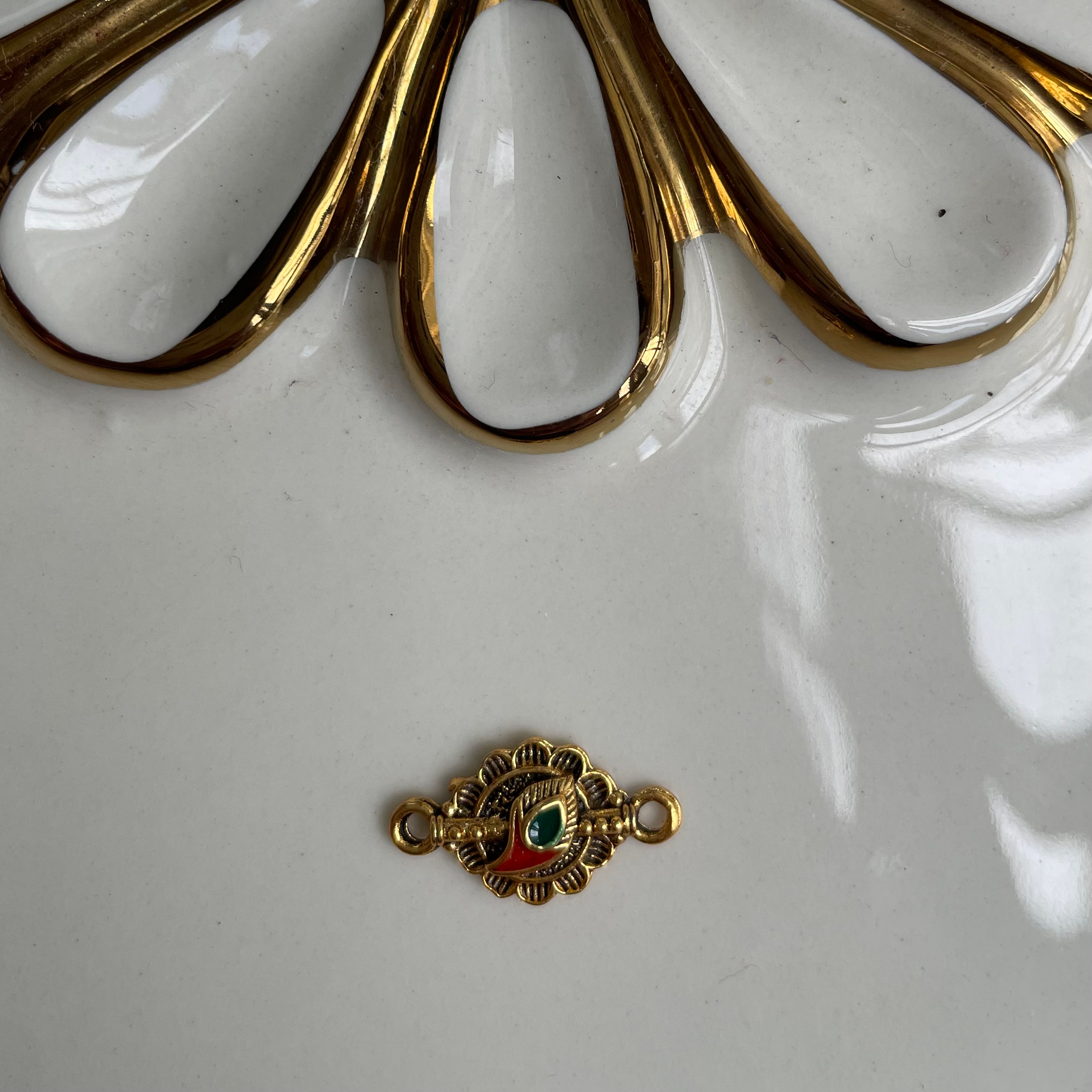 Rakhi Charm 1 image 0